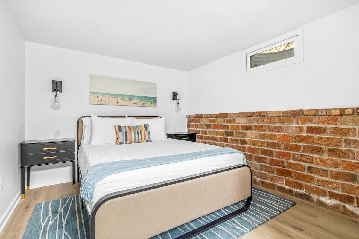 Bedroom 4 is on the lower level & has a queen-size bed.