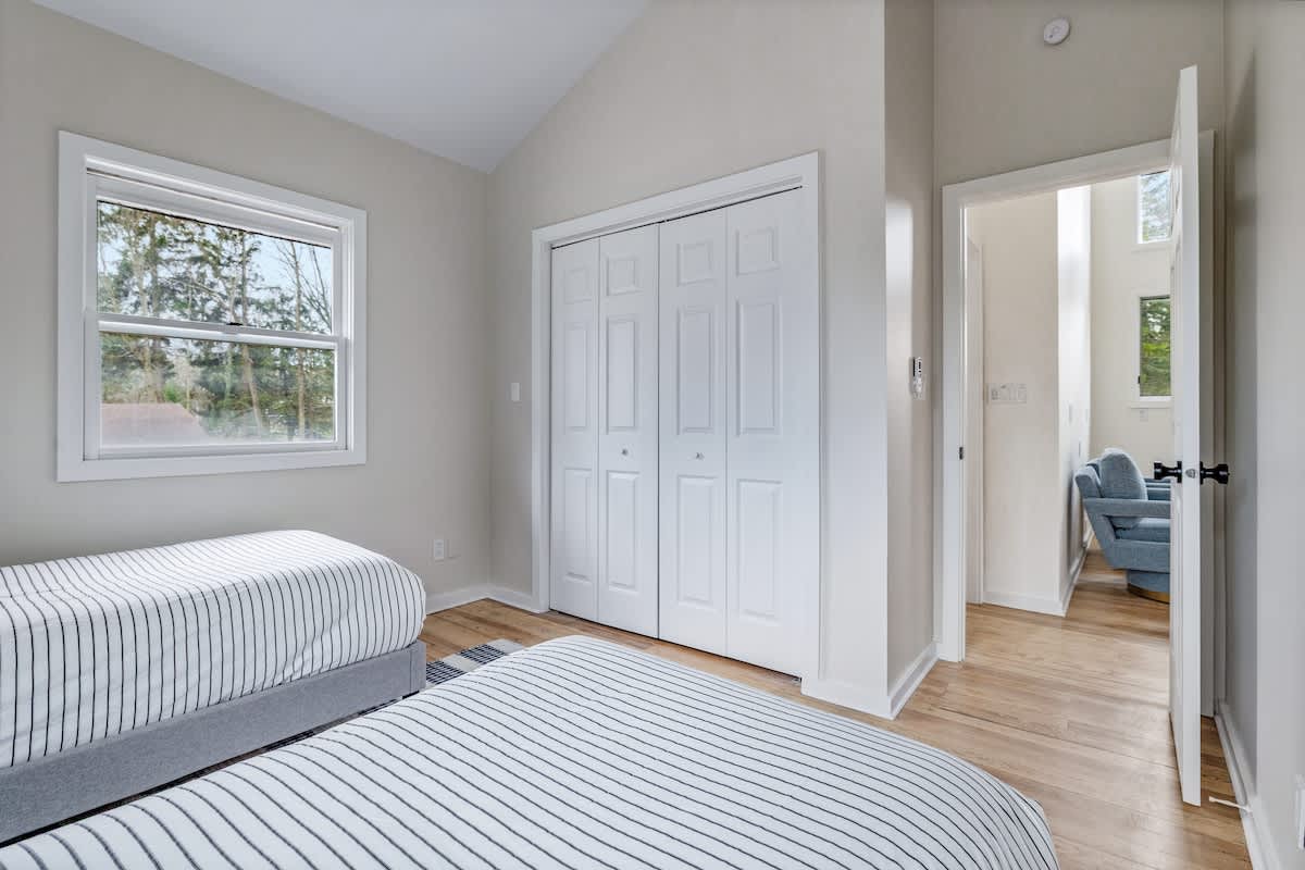 This fresh and airy twin room is perfect for sharing. Light-filled, comfy, and just steps from the chill loft lounge.