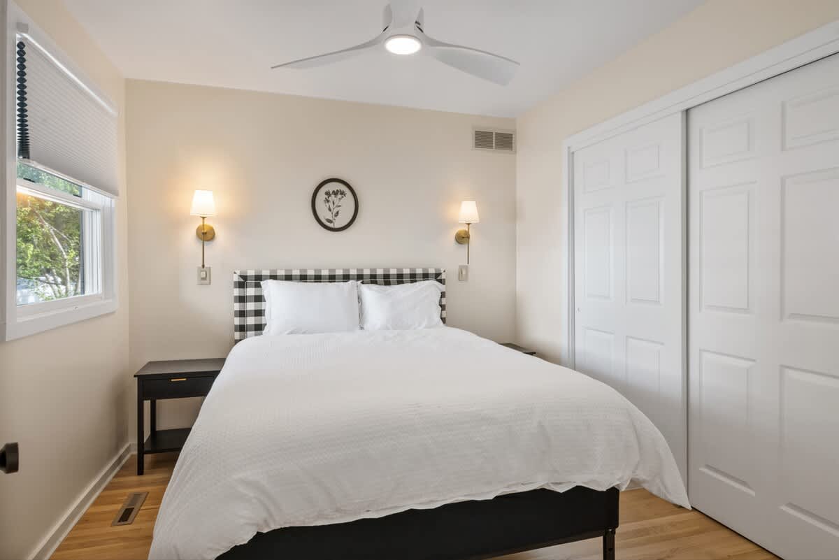 Bedroom 3 is on the main level & has a queen-size bed.