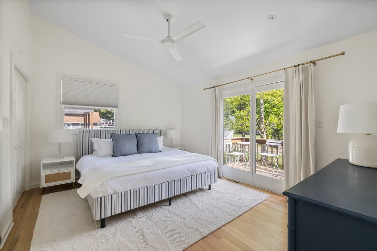 The primary bedroom is on the main level & has a king-size bed.