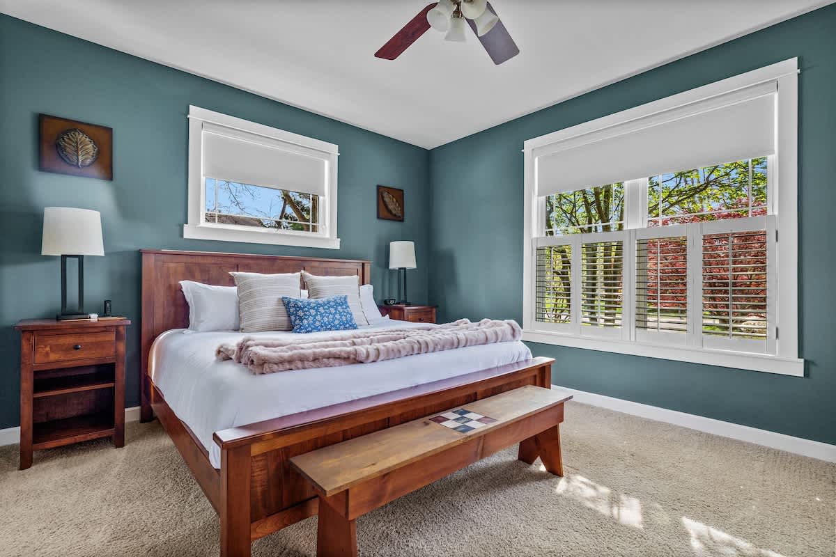 Primary bedroom is on the main level & has a king-size bed.