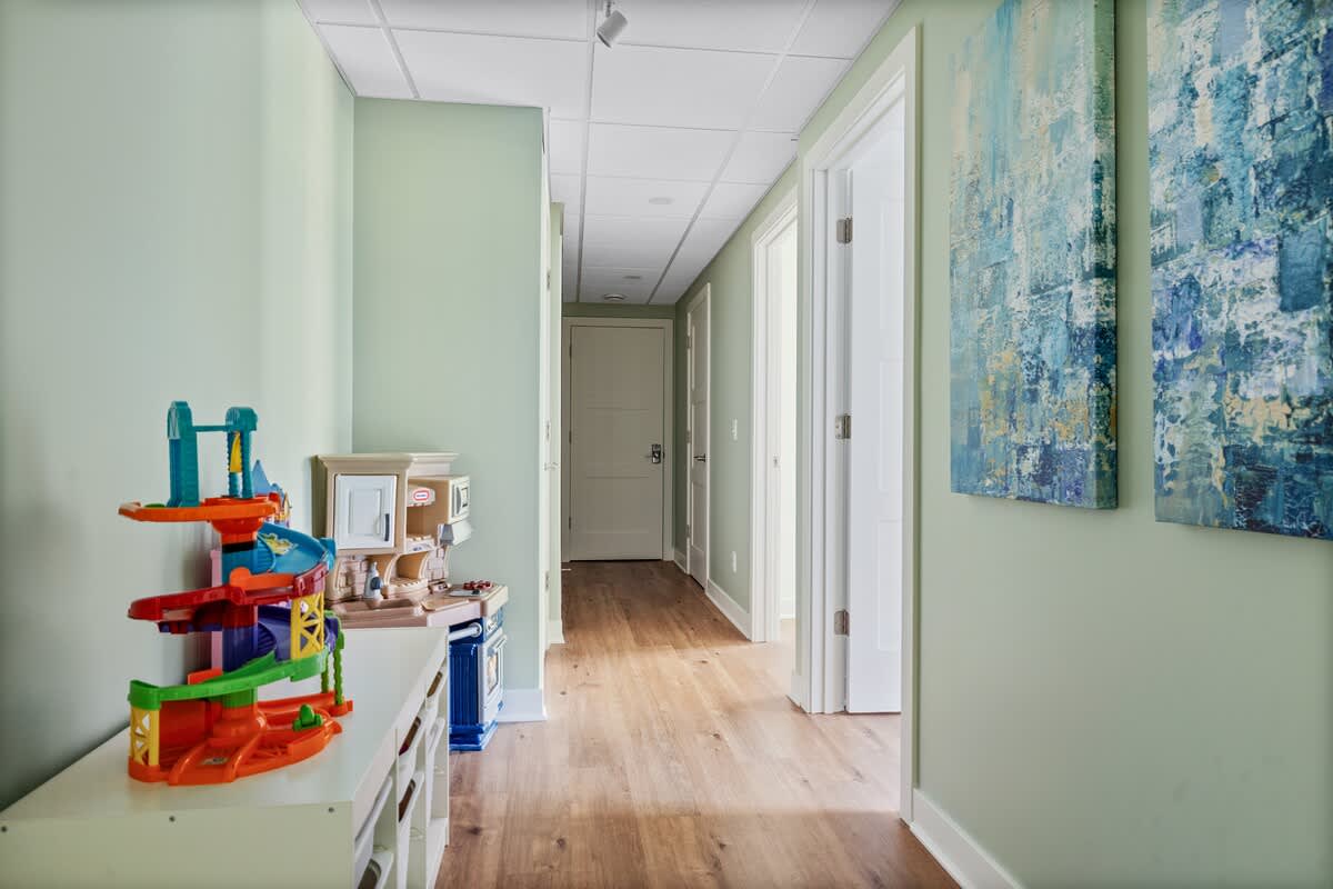 A built-in play space that gives parents a breather and kids a thrill.