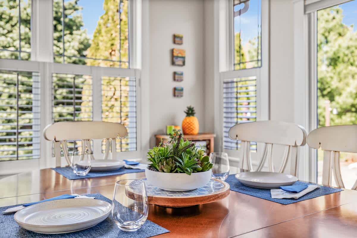 Gather, laugh, and connect around this sunlit family table.