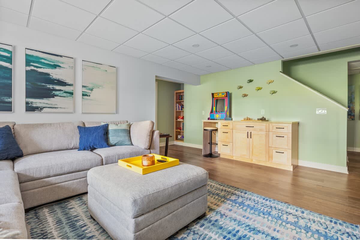 Arcade-ready and cozy as can be—this space brings the fun.