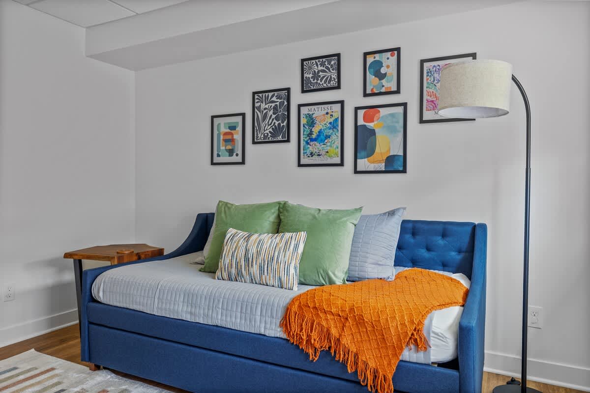 Nap spot by day, cozy crash pad by night—this bed does both!