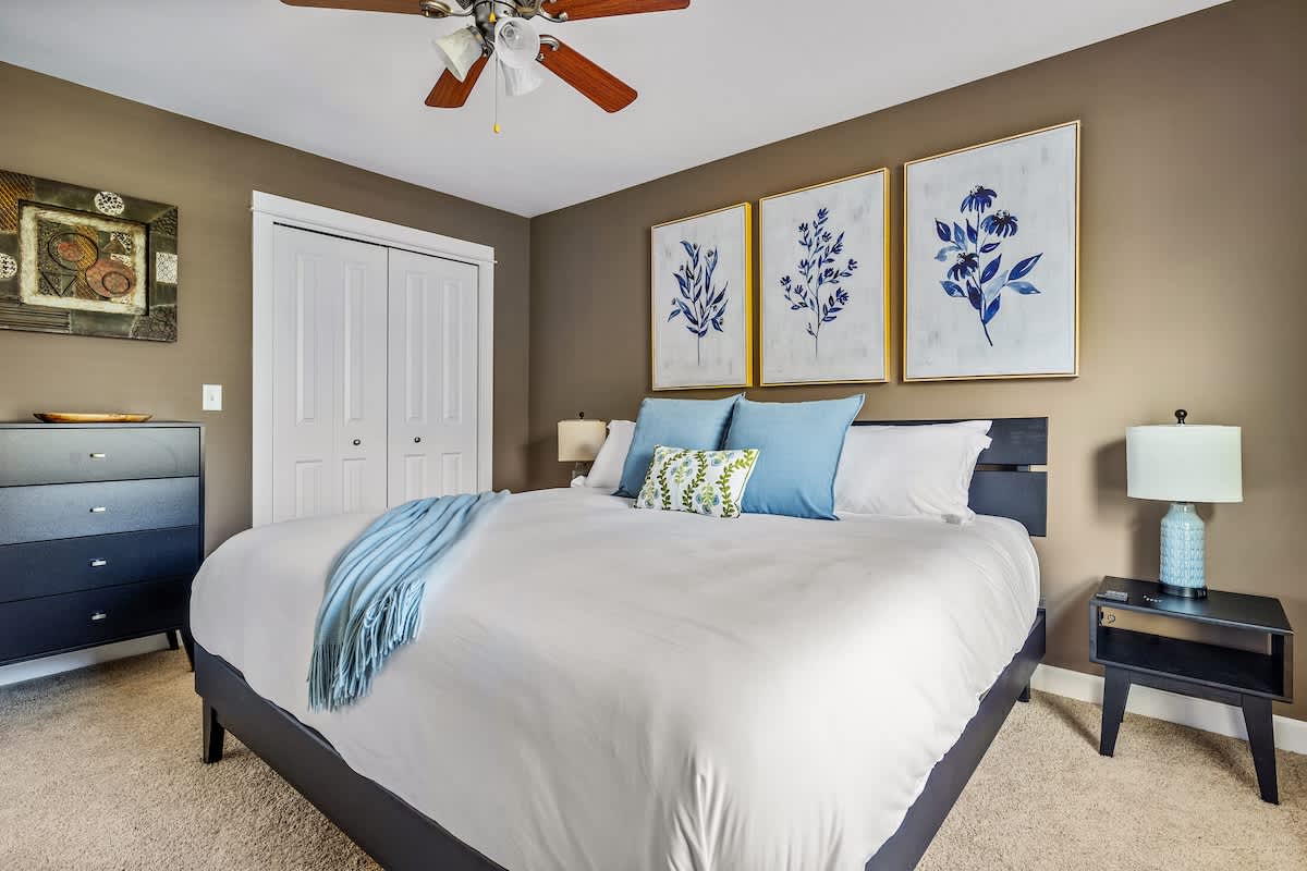 Crisp linens, calming art, and a room made for deep rest.