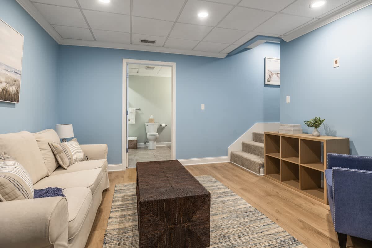 Need a break from the action upstairs? This cozy nook is your go-to for calm and comfort.