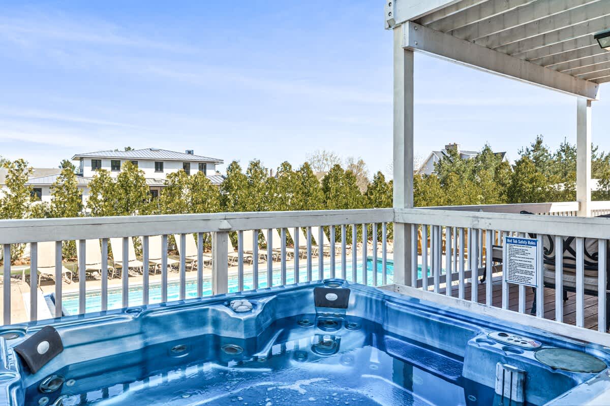 Soak in style with pool views and blue skies all around.