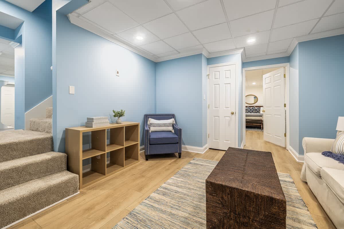 Need a break from the action upstairs? This cozy nook is your go-to for calm and comfort.