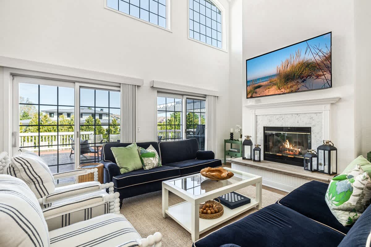 Grand living space with warmth, light, and style.