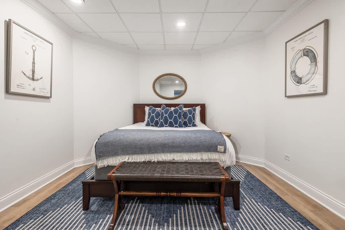 Other sleeping area is on the lower level & has a queen-size bed.