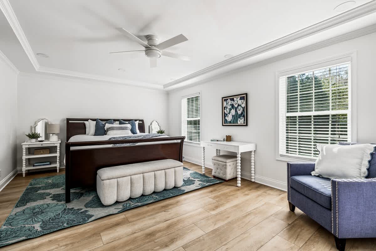 Primary bedroom is on the main level & has a king-size bed.