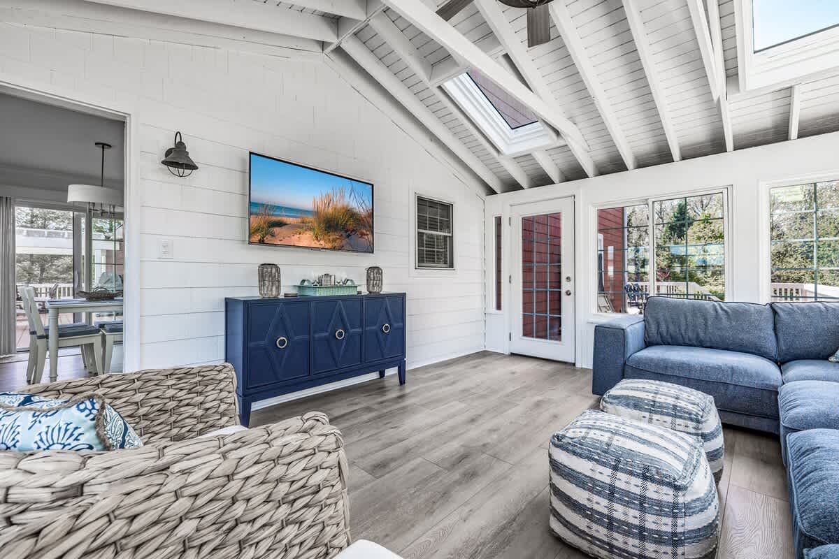 Relax under vaulted ceilings in this breezy indoor retreat.