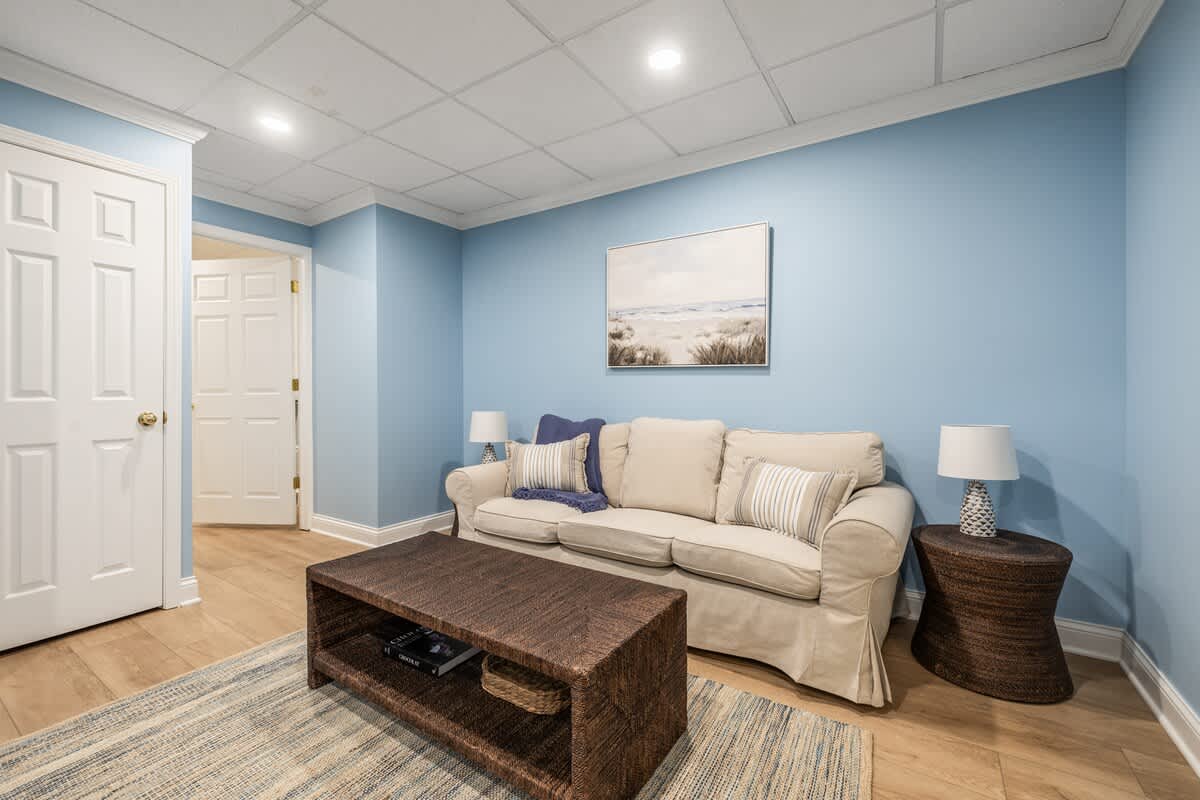 This comfy corner is where sandy toes rest, giggles echo, and family memories take shape.