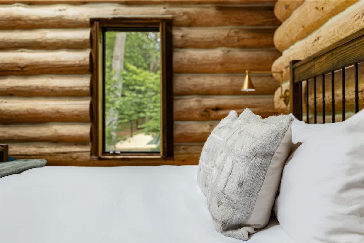 Indulge in the ultimate luxury of nature with this charming log cabin.
