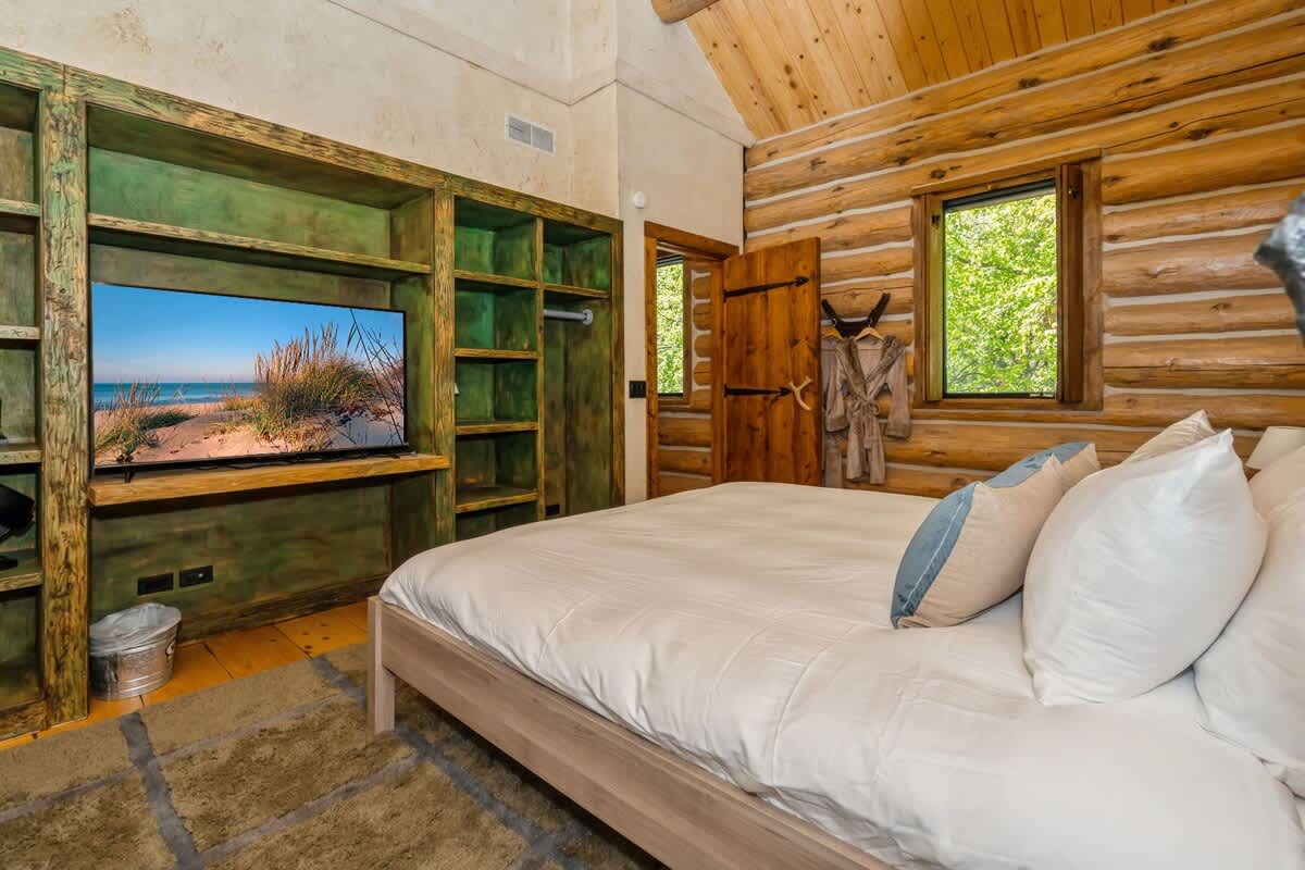 Nestled in timber walls, this room offers rest, comfort, and calming vibes.