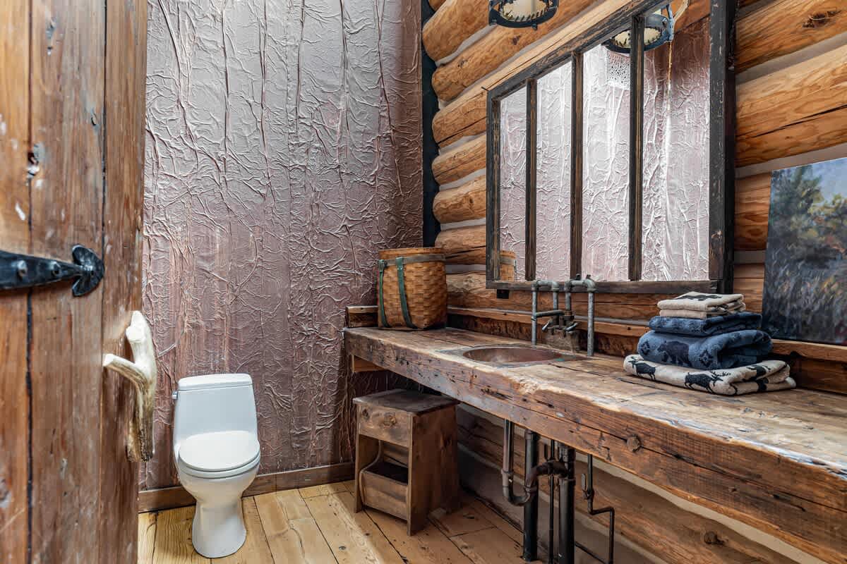 This stunning wooden wall transforms your daily rituals into a soothing escape.