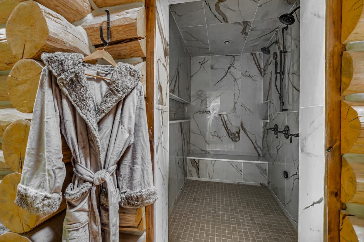 Wrap yourself in softness after a soothing, marble-tiled rinse.