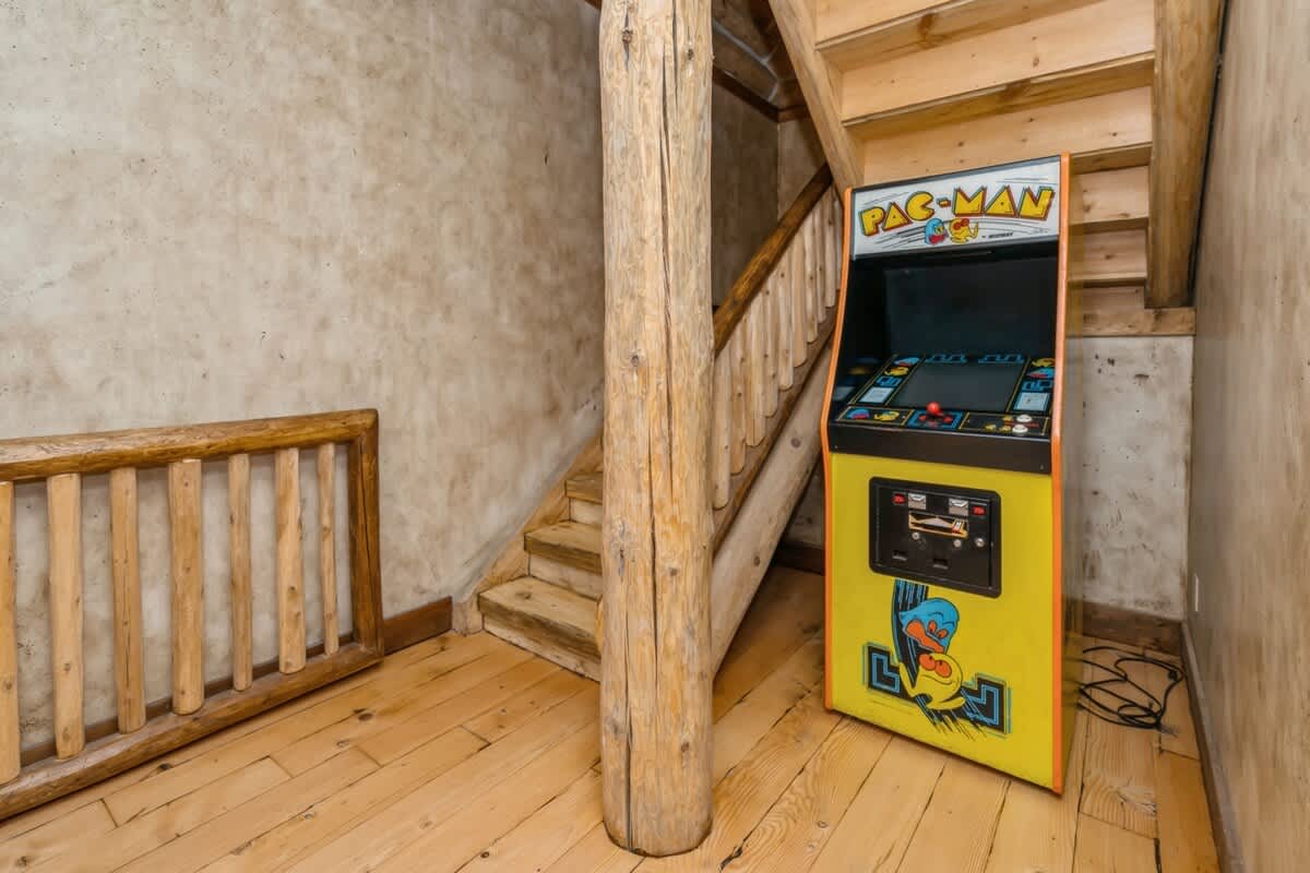 Game on! Pac-Man’s waiting under the stairs.