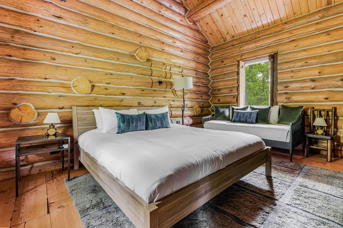 Bedroom 2 is on the upper level & has a king-sized bed and a daybed.