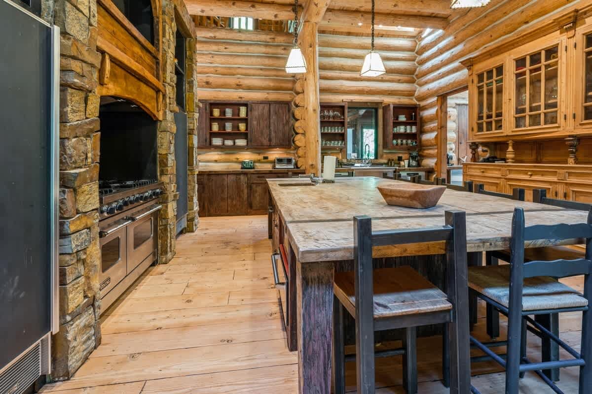 A rustic gourmet hub perfect for family feasts and fireside treats.