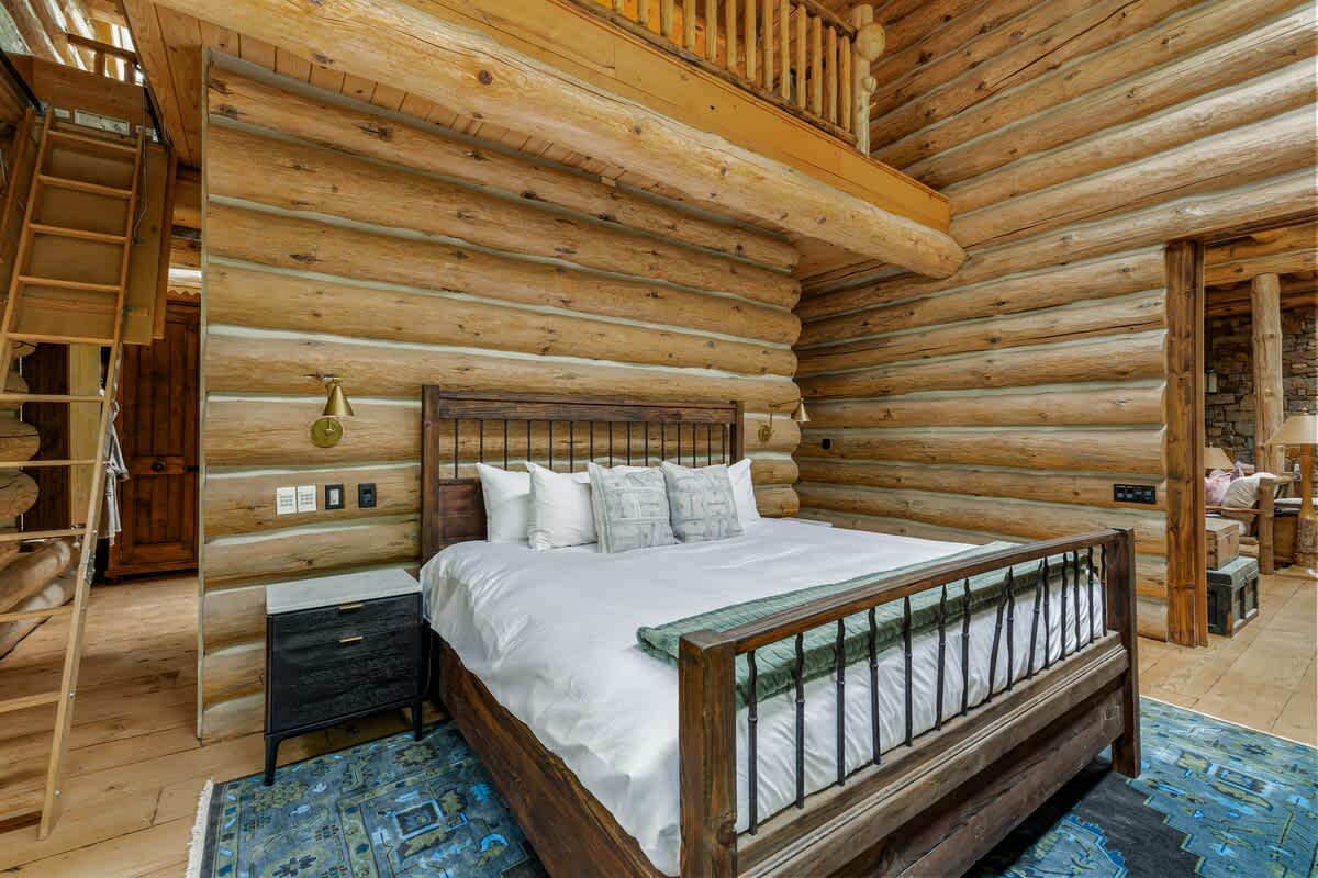 The primary bedroom is on the main level & has a king-sized bed.