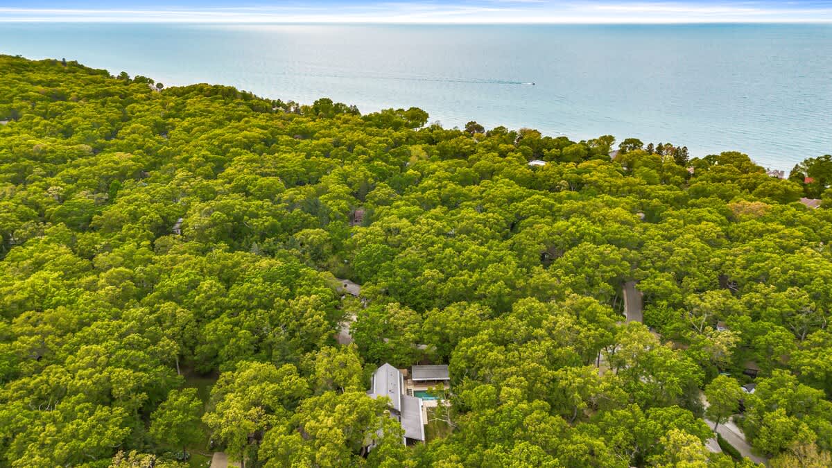 Nestled in lush greenery, just a 10-minute walk to the beach.