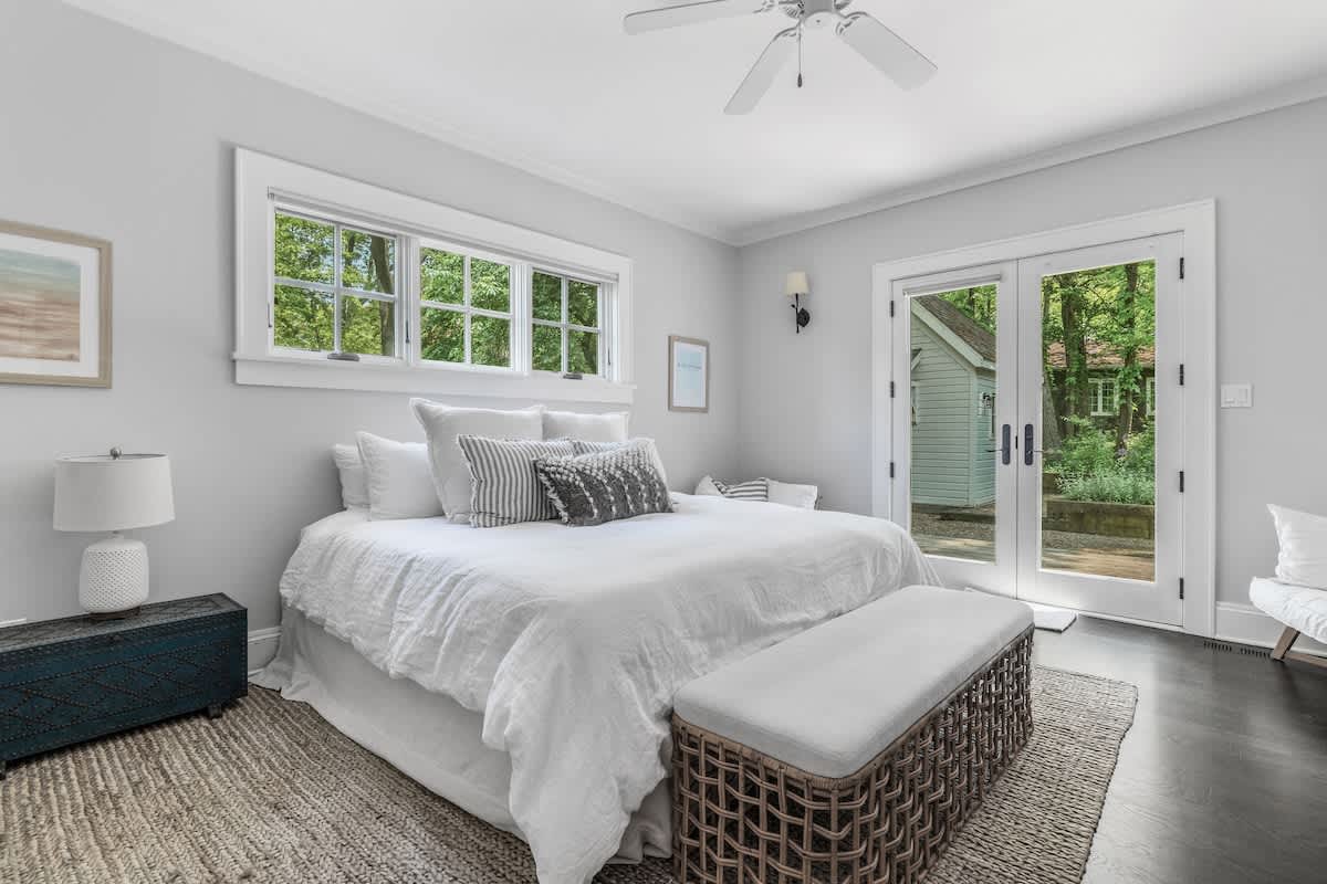 Primary bedroom is on the main level & has a king-size bed.