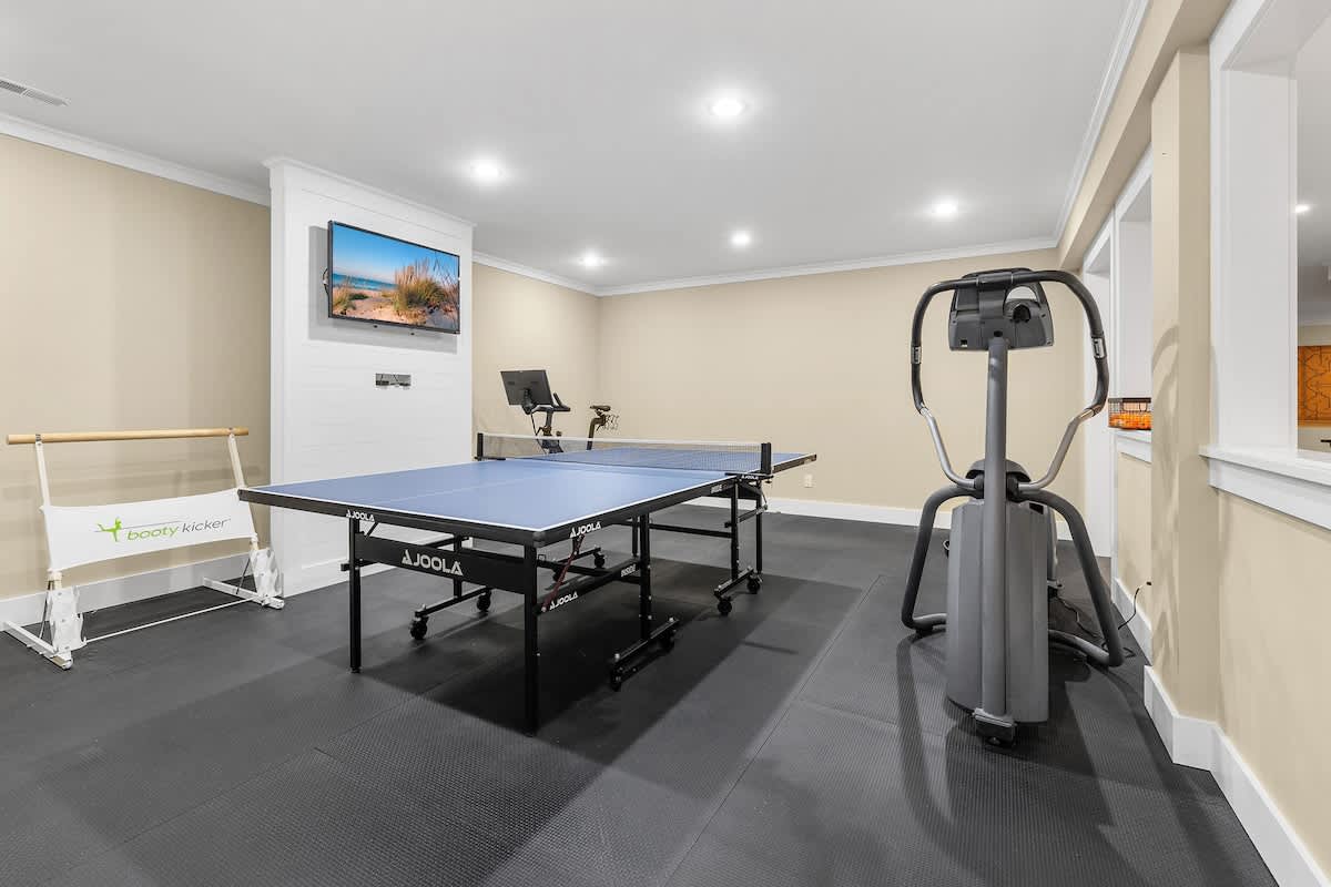 Game, sweat, repeat—your upscale fitness lounge awaits.