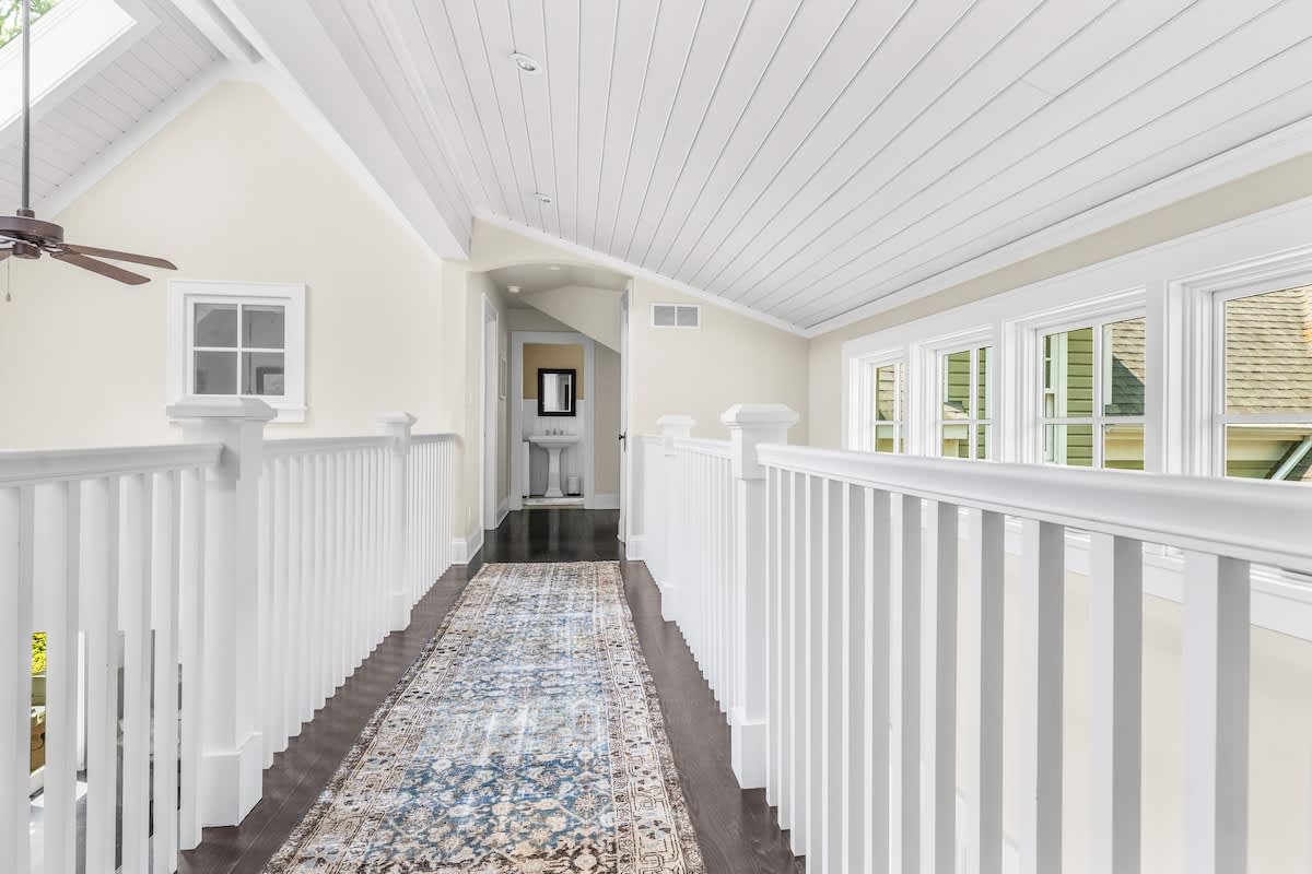 From suite to suite, stroll in style under pitched ceilings.