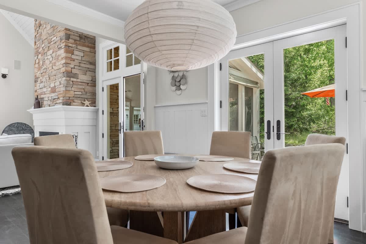 Luxury dining with a view - indoor elegance, outdoor glow.