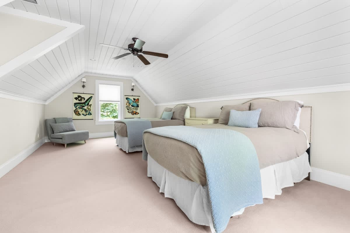 Bedroom 3 is on the upper level & queen and double-size bed.