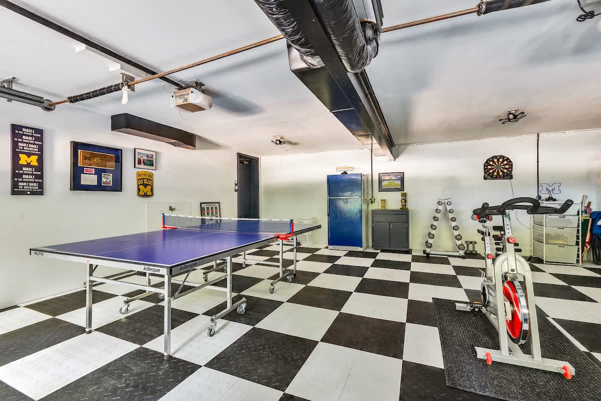 Game on! Ping pong, darts, and a mini gym right at home.