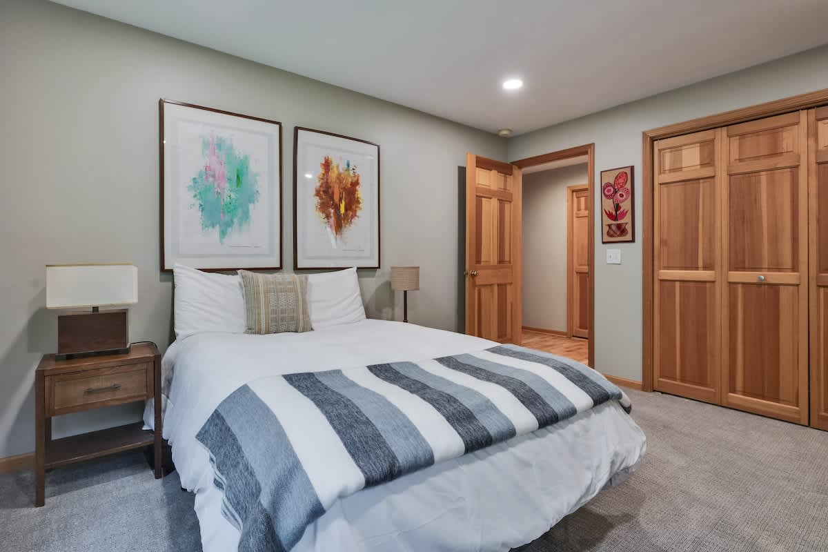 Bedroom 5 is on the main level & has queen-size bed.