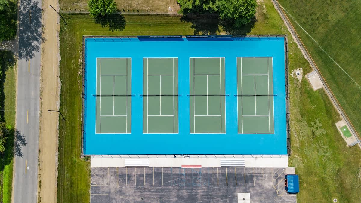 Hit the courts—just 4 minutes from Hearth & Timber.