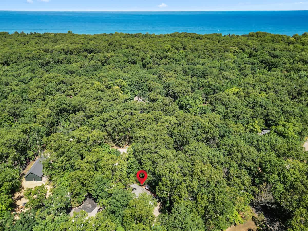 Lakeside living, hidden in the treetops.