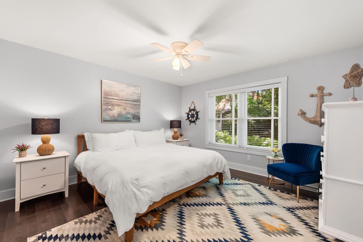 Primary bedroom is on the main level & has a king-sized bed.