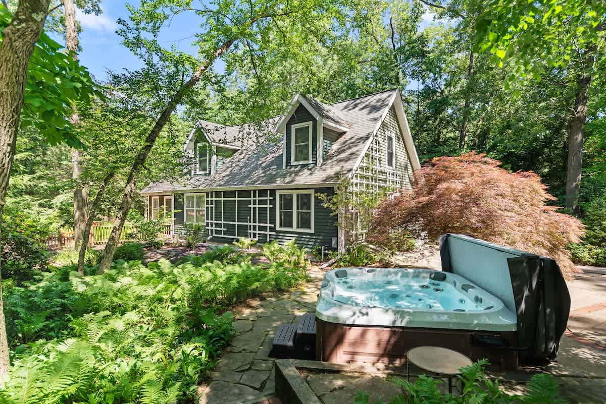 Soak under the trees in your private woodland spa.