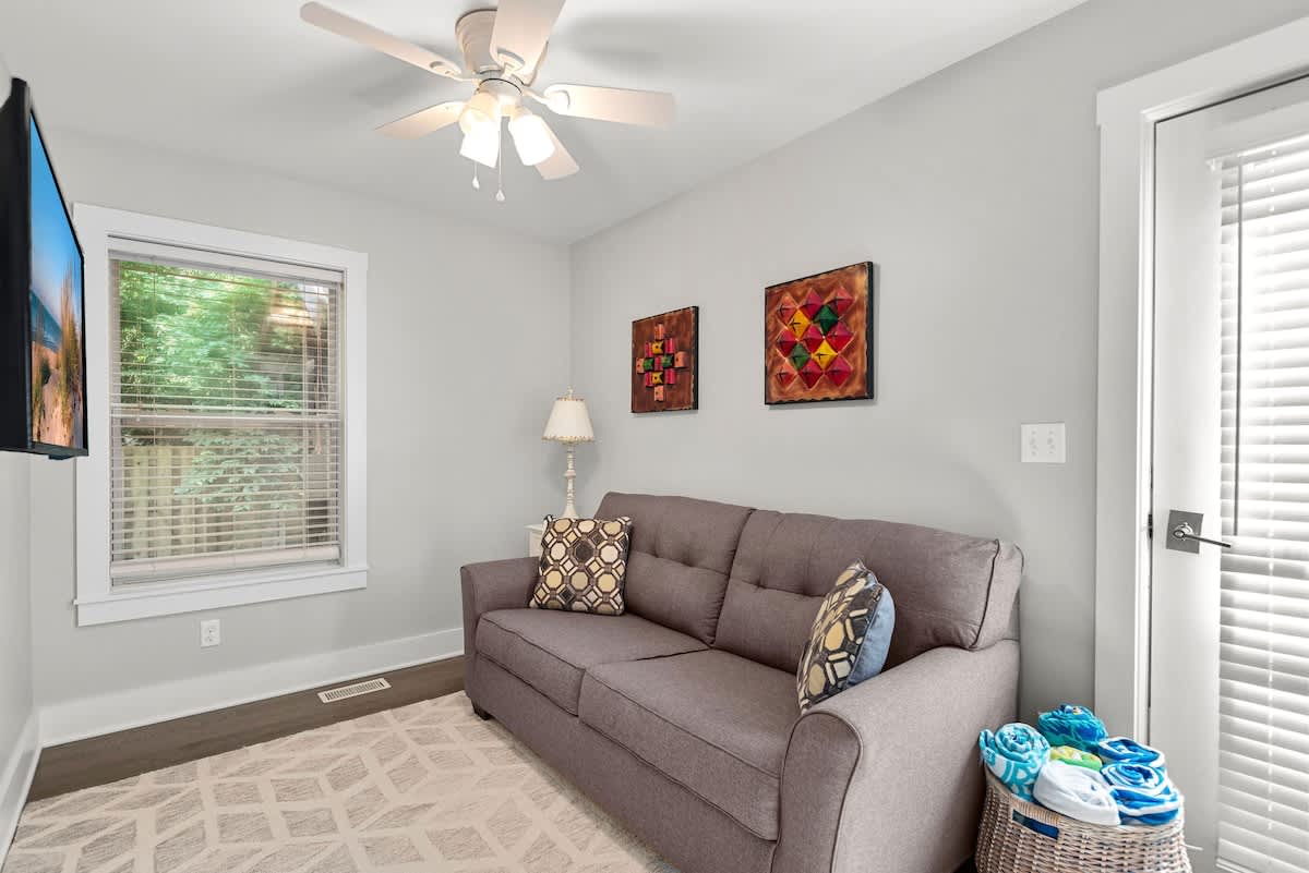 A cozy corner made for lazy afternoons and late-night flicks.