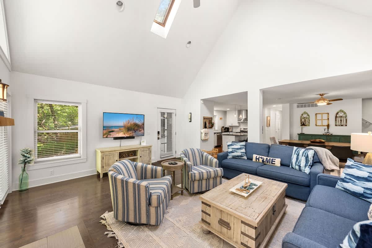 Cozy up beneath the vaulted ceiling glow.