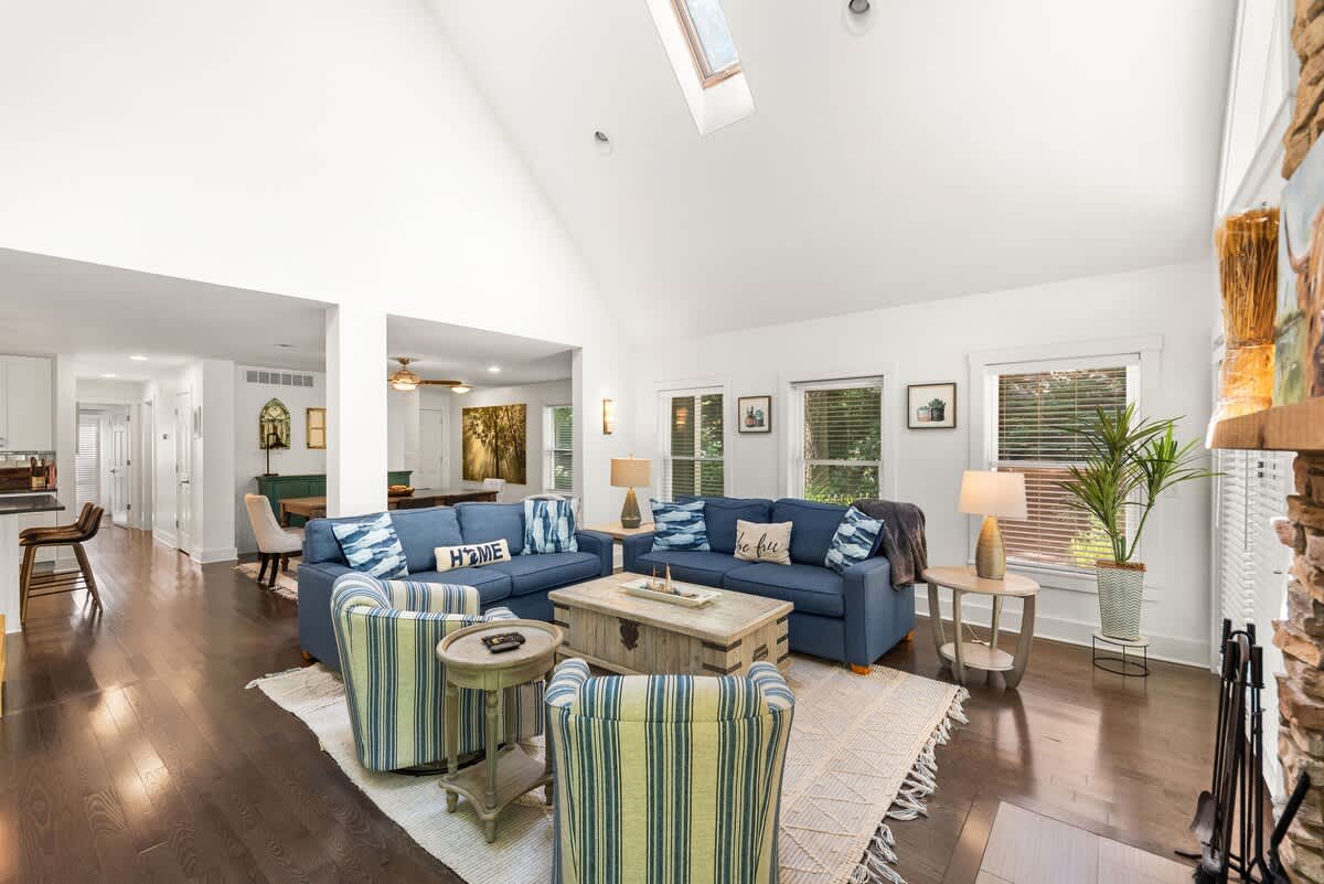Open-concept living with warm textures and coastal flair.