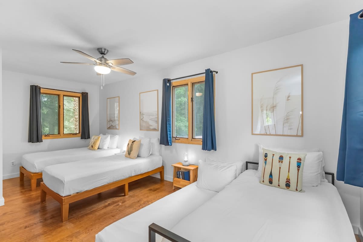 Bedroom 3 is on the upper level & has 3 twin beds and a trundle bed.