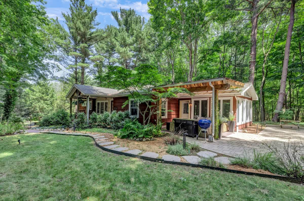 Grill, gather, and unwind under a forest canopy.