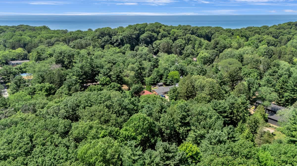 A tucked in the trees, just minutes from Lake Michigan.