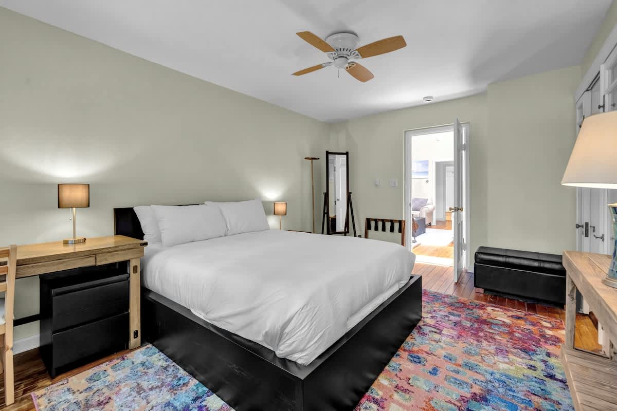Primary bedroom is on the main level & has a queen-sized bed.