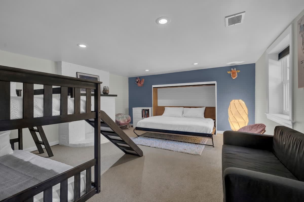 Bedroom 3 is on the lower level & has a Murphy full-sized bed and a twin bunkbeds.