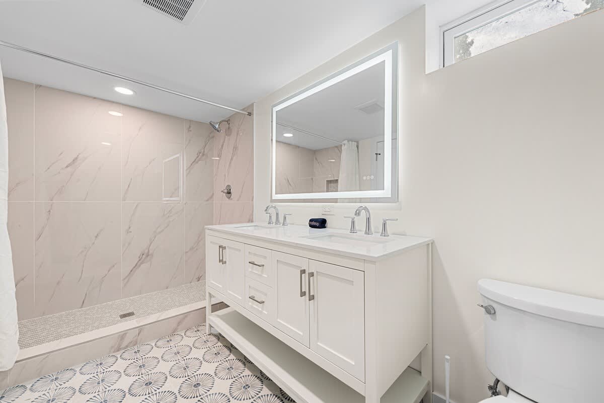 Spa-inspired bath with walk-in shower & double vanity.