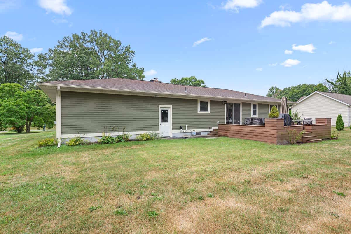 Enjoy endless summer nights on your spacious deck and fun-filled days in the yard.