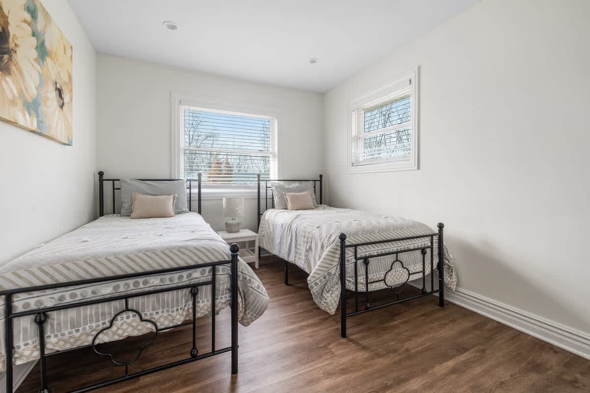 Bedroom 3 is on the main level & has 2 twin beds.