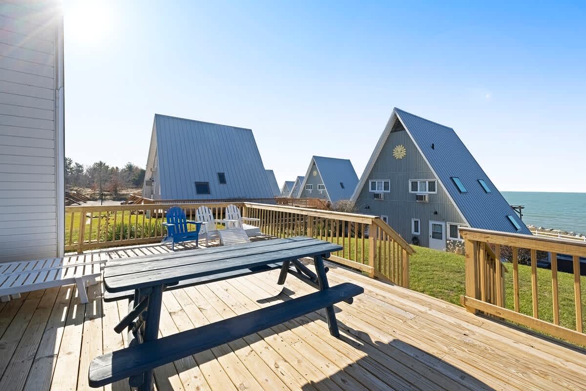 Enjoy sunny lounging and lakeside living on the deck.